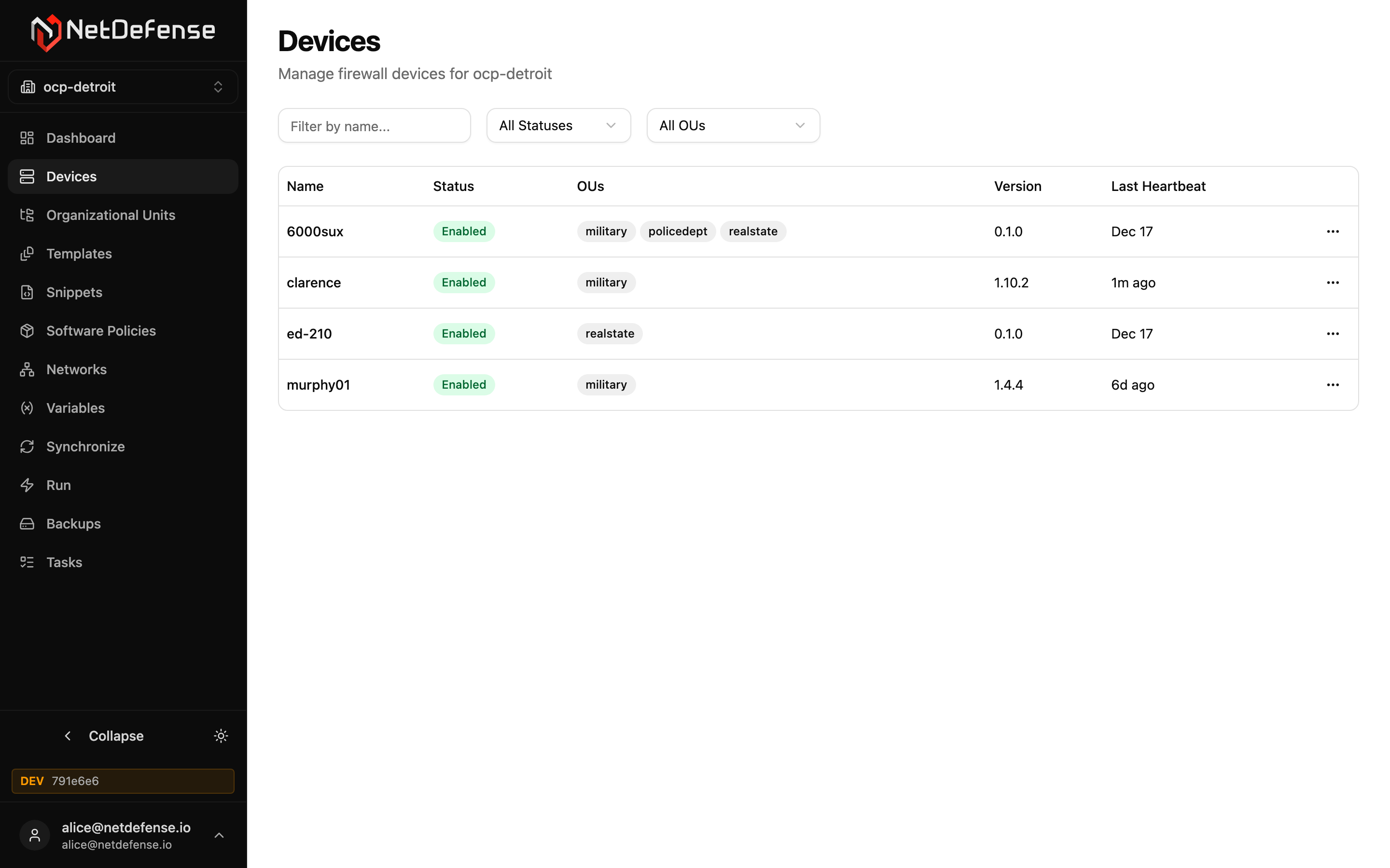 NDWeb Devices list showing four firewalls with status, OU membership, version, and last heartbeat